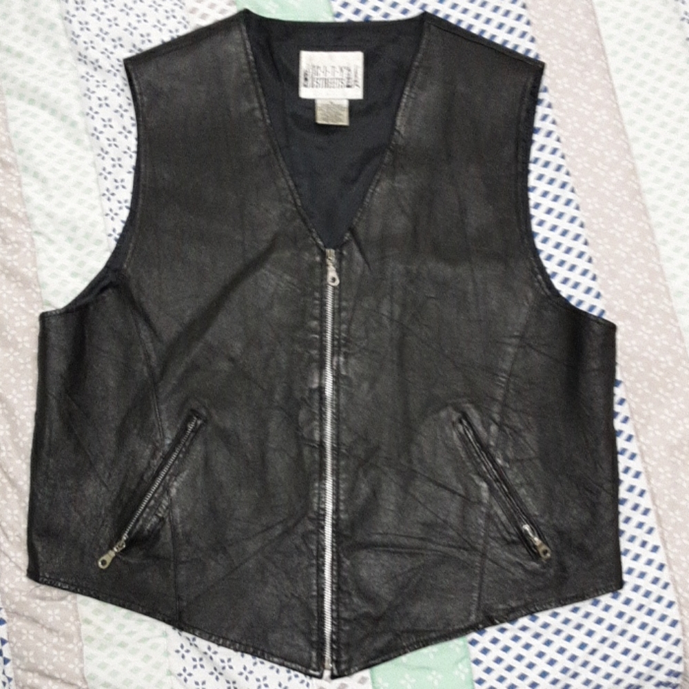 Genuine leather vest.